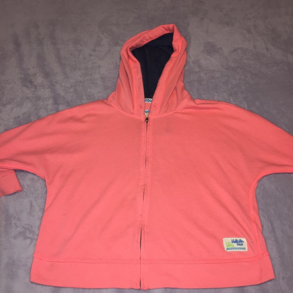 A light pink hollister jacket